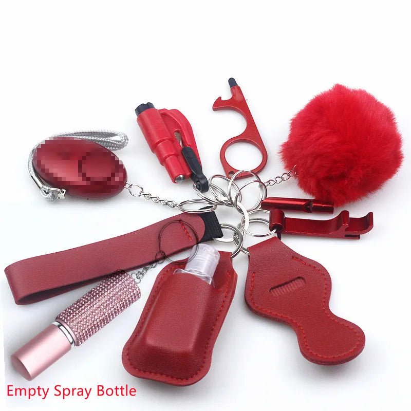 The Kiss Me Later keychain set includes red personal safety accessories like a pom-pom, sanitizer in holder, lipstick-shaped item, whistle, no-touch tool, alarm, and strap—ideal for outdoor adventures and everyday security.