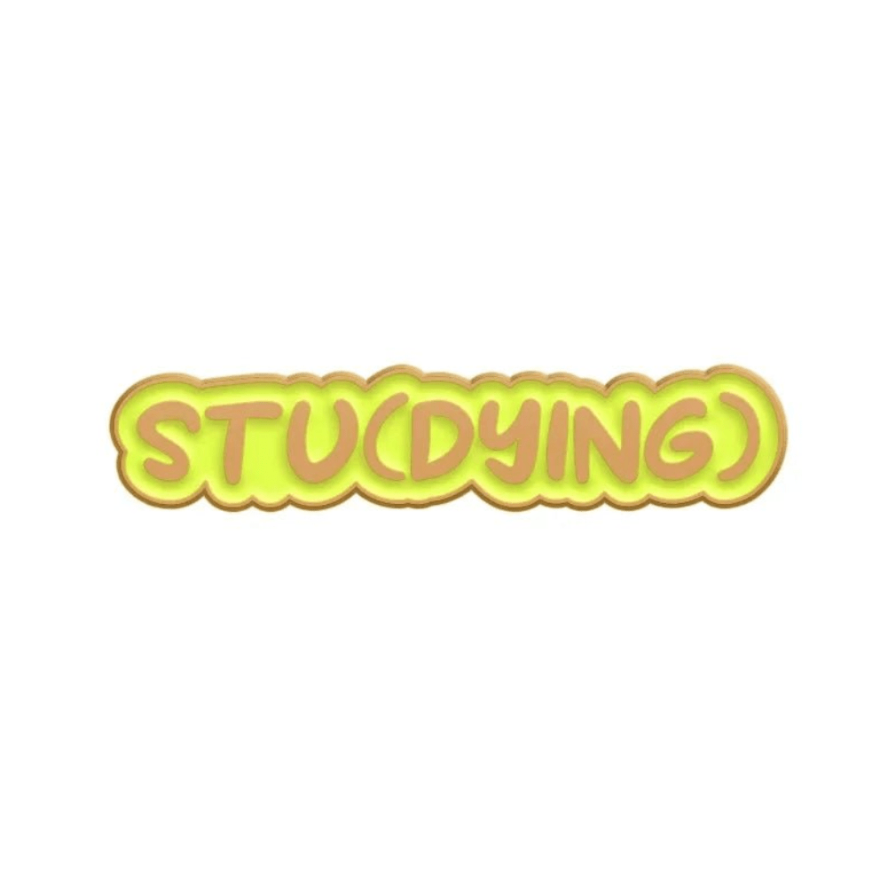 The word STU(DYING) appears in bold, rounded yellow letters with a brown outline on a white background—“DYING” in parentheses adds humor. Great to pair with your Cute But Psycho enamel pin!.
