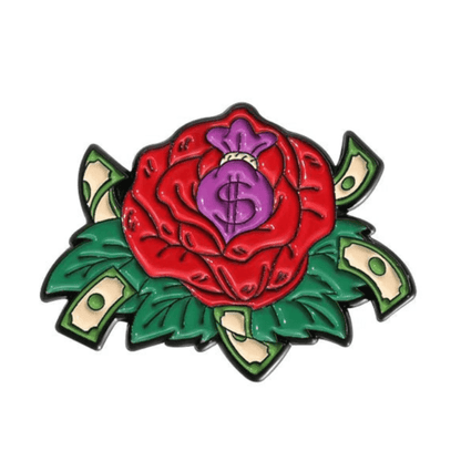 A red rose with green leaves, dollar bills, and a purple money bag with a dollar sign at the center is finished with the bold pop-art charm of Kiss Me Later’s Red Lips Cash Roll.