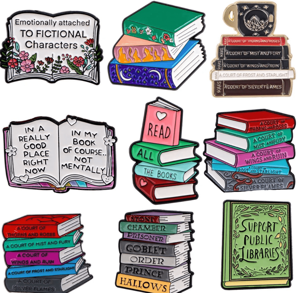 Enamel pins shaped like vibrant book stacks, perfect for book lovers, feature phrases such as Emotionally attached to fictional characters, Read all the books, and Support public libraries.