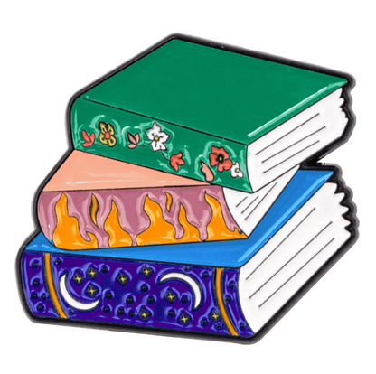 An illustration of three stacked books—a green one with flowers, a pink one with orange flames, and a blue one with moons and stars—all outlined in black. A perfect pick for Booktroverts 