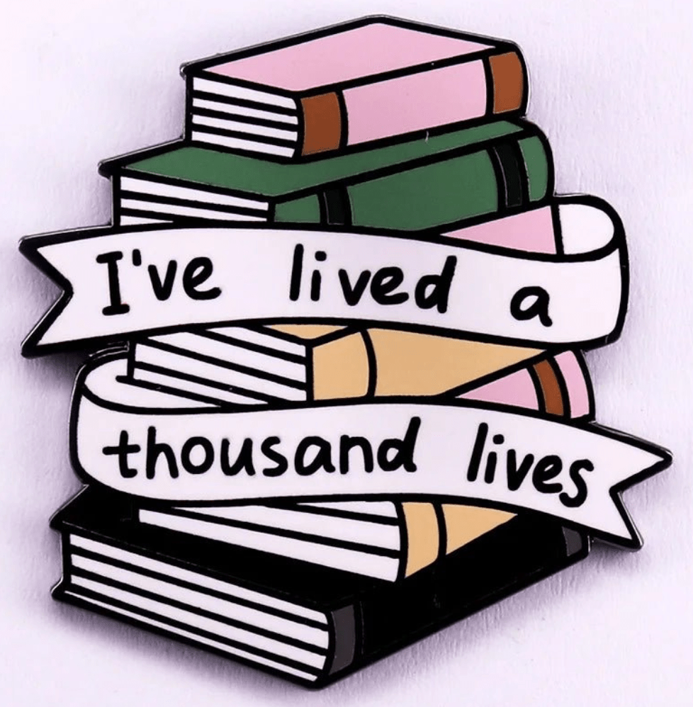 A stack of colorful books with a white banner that reads, Ive lived a thousand lives—the perfect enamel pin for romance readers and book lovers
