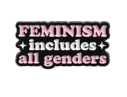 Enamel pin features FEMINISM includes all genders in pink and white on black with two white sparkles—making a bold statement for gender equality beyond the patriarchy.