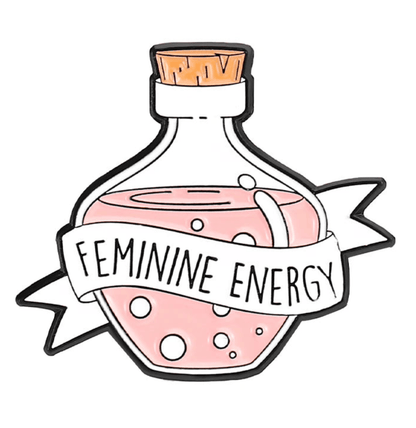 A round glass bottle enamel pin featuring a cork top, pink bubbly liquid, and a white banner reading FEMININE ENERGY—an eye-catching addition to any feminist pins collection.