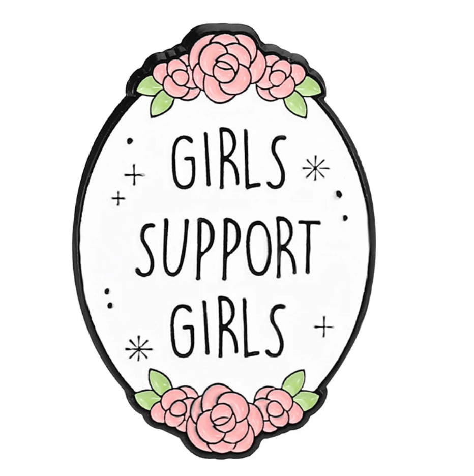 Enamel pin, shaped like an oval sign with pink roses and green leaves, displays “Girls Support Girls” in bold black letters with sparkles—perfect for any feminist pin collection.