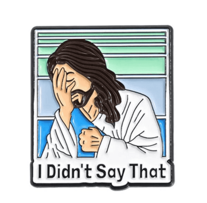 Illustrated pin shows Jesus facepalming—with head bowed and hand to his face—above the text I Didnt Say That on a colorful, playful background. Perfect for anyone with a sense of humor on Team Jesus.