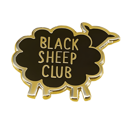 My Cutesy Era black and gold enamel pin features a sheep design with gold edges and BLACK SHEEP CLUB written in gold on its body.