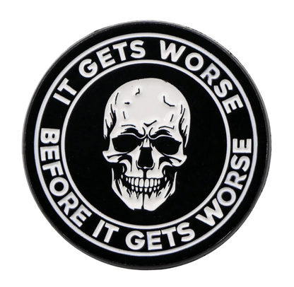 A black circular emo pin by Kiss Me Later featuring a white skull at the center. Bold white text around it reads: IT GETS WORSE BEFORE IT GETS WORSE—perfect for skeleton pin fans.