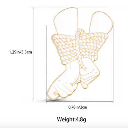 Line drawing of two hands bound with rope, sized 1.29 in (3.3 cm) tall and 0.78 in (2 cm) wide. Weighs 4.8g—an understated rope bondage pin from My Cutesy Era, perfect for your collection.