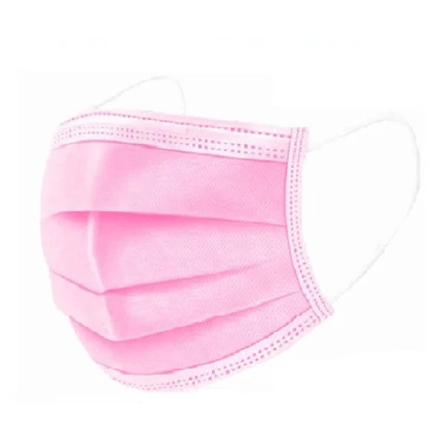 A Kiss Me Later pink disposable medical face mask with white ear loops is shown. A blue oval icon at the bottom right reads 50 PCS, indicating a bulk pack of triple-layer masks for enhanced protection.