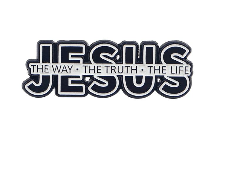 The Kiss Me Later Jesus enamel pin features JESUS in bold black letters with a white strip reading THE WAY • THE TRUTH • THE LIFE—an inspiring faith accessory for any believer.