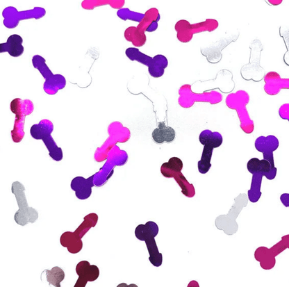 Kiss Me Later metallic adult party confetti shaped like penises in pink, purple, and silver scattered on a white background.