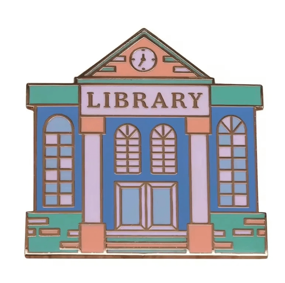 Colorful library pin, shaped like a library with arched windows, a clock above the door, and “LIBRARY” at the top—perfect for book lovers or enamel pin collections.