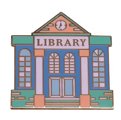 Colorful library pin, shaped like a library with arched windows, a clock above the door, and “LIBRARY” at the top—perfect for book lovers or enamel pin collections.