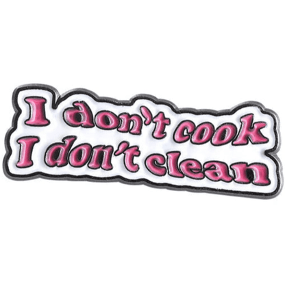 A My Cutesy Era badge featuring bold pink and white I don’t cook I don’t clean text on a white background with black outline—ideal for WAP fans or those loving the Hot Girl Bummer pin aesthetic.