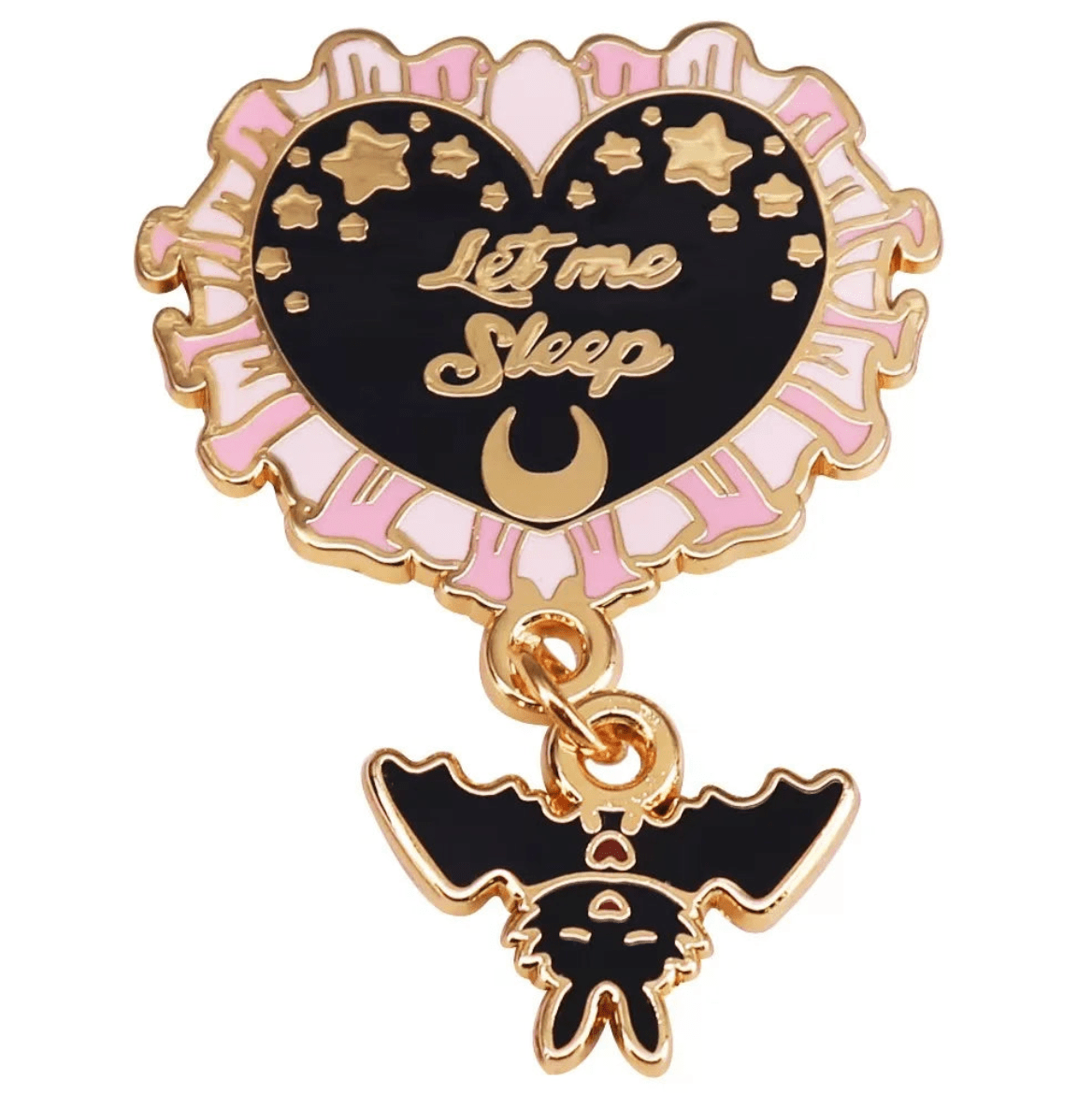 Heart-shaped Let Me Sleep enamel pin features gold edges, pink frills, a black center with “Let Me Sleep” among stars and a crescent moon, and is finished with a hanging black bat charm.