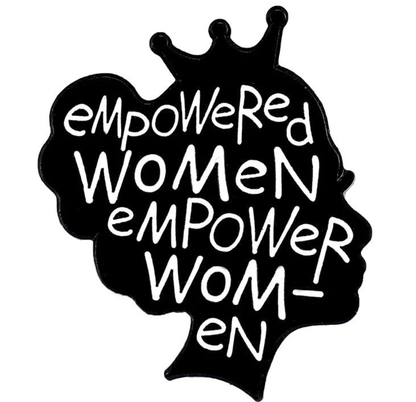 A black silhouette of a womans head with a crown and empowered women empower women in white text—this motivational enamel pin by My Cutesy Era is perfect for anyone who believes Beautiful Isnt A Size.
