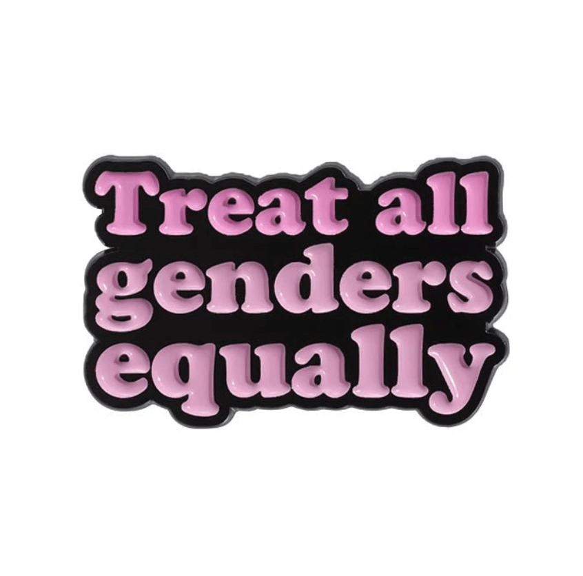 My Cutesy Era’s enamel pin features pink bubble letters on black that say “Treat all genders equally,” making it a bold daily reminder to support inclusivity.