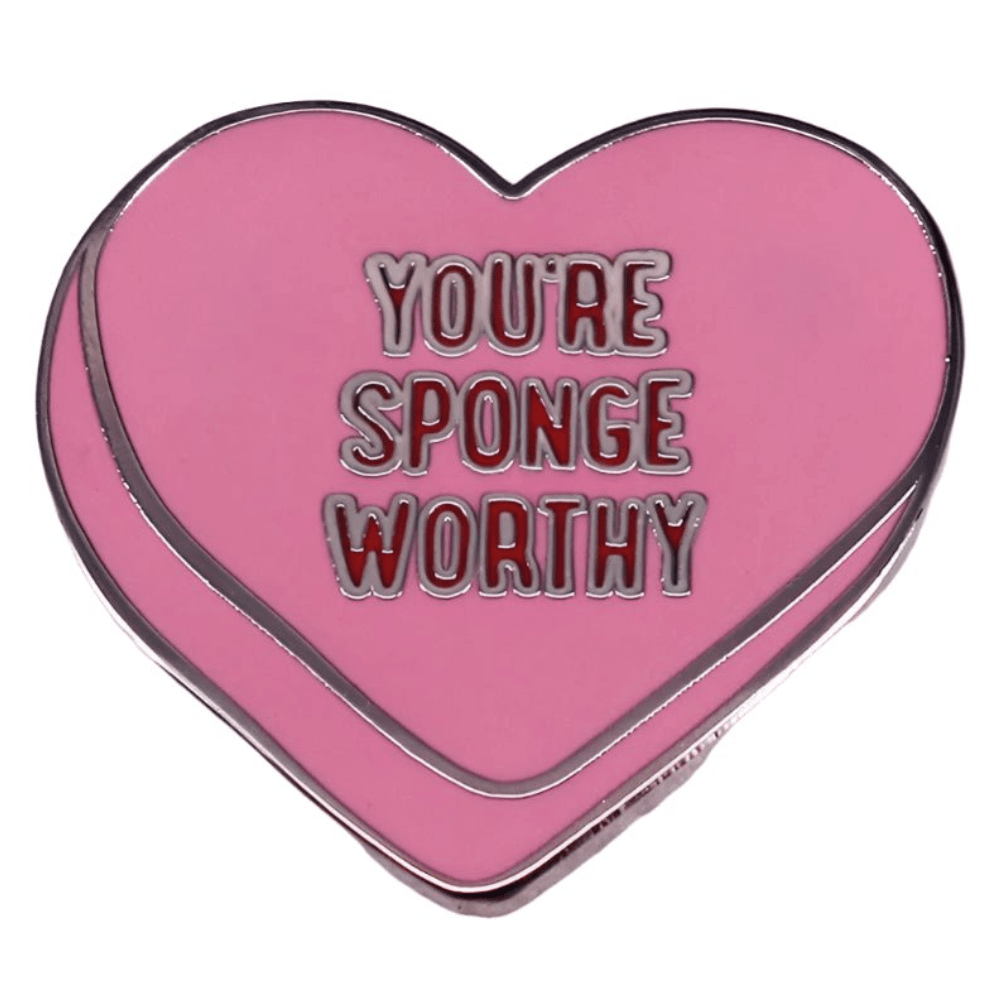 The My Cutesy Era pink heart enamel pin features YOU’RE SPONGE WORTHY in bold white and red, making it a perfect, adorable gift to show your soul mate how special they are!.