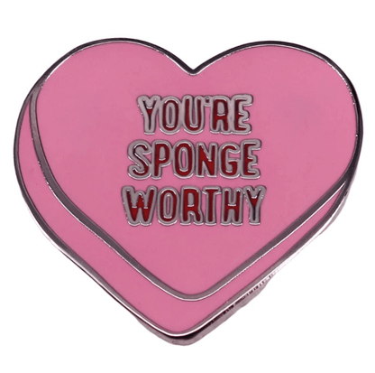 The My Cutesy Era pink heart enamel pin features YOU’RE SPONGE WORTHY in bold white and red, making it a perfect, adorable gift to show your soul mate how special they are!.