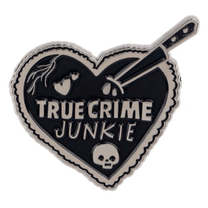 My Cutesy Era heart-shaped black pin with scalloped edges features TRUE CRIME JUNKIE, a skull, knife and drops, and a broken heart graphic—perfect for true crime fans.