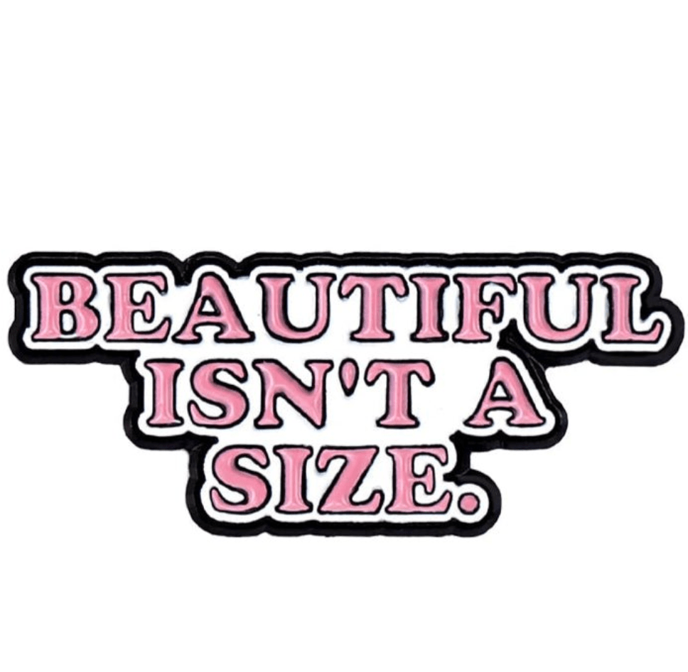 My Cutesy Era enamel pin features bold, pink letters outlined in black that read BEAUTIFUL ISNT A SIZE. This motivational accessory promotes body positivity and self-acceptance.