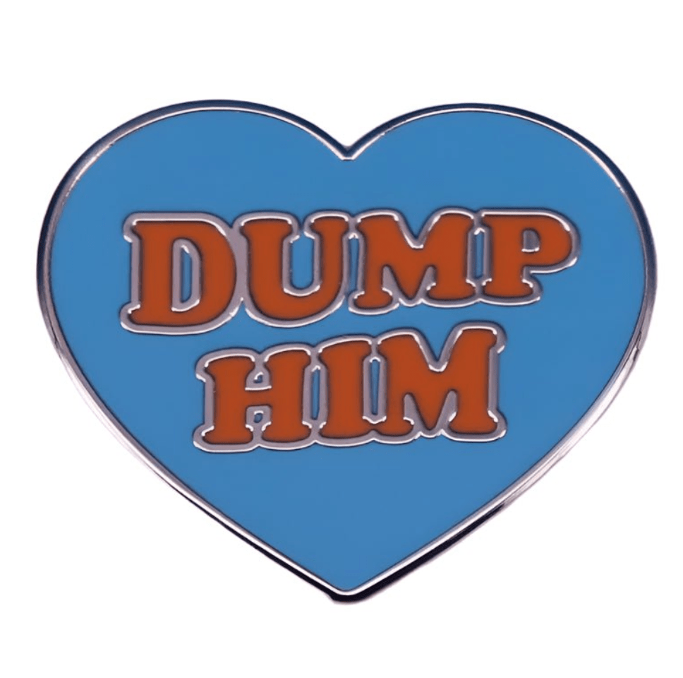 Add sass and style to your collection with My Cutesy Era’s blue heart pin, featuring bold orange “DUMP HIM” lettering—a cute accessory that stands out!.