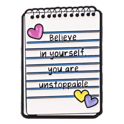 My Cutesy Era’s cartoon-style notepad with blue lines and colorful hearts features the handwritten message Believe in yourself, you are unstoppable—a motivational reminder perfect for positive affirmations and mental wellness.