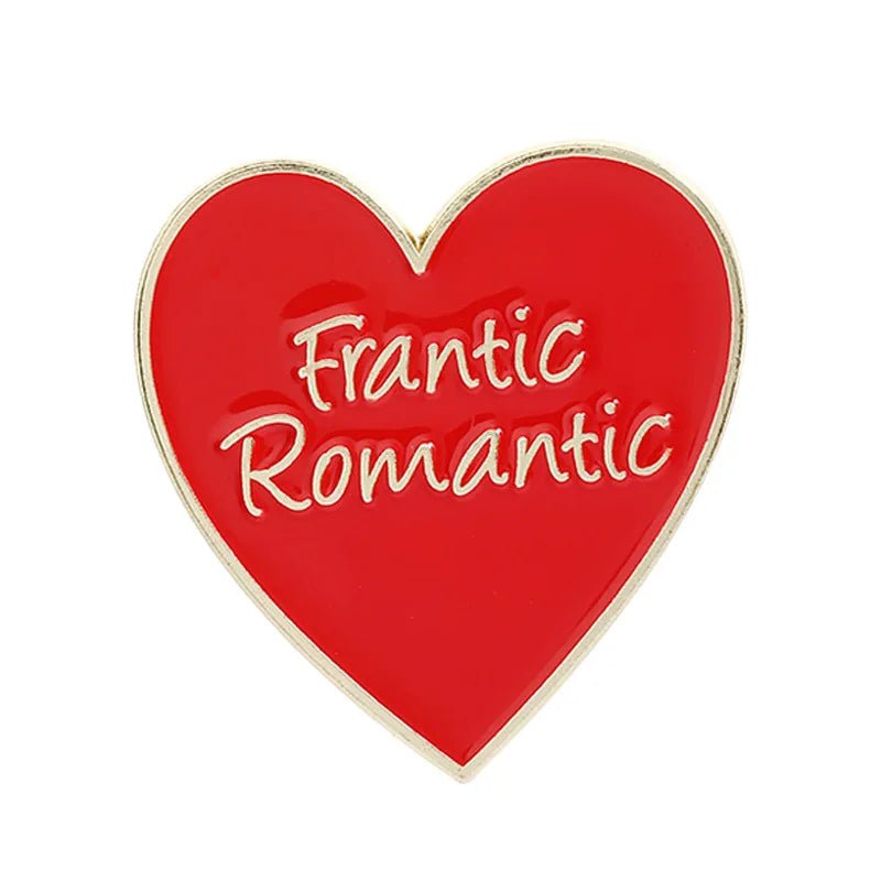 Red and gold heart-shaped enamel pin features Frantic Romantic in white script across the center.