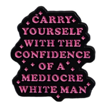 A black sign from My Cutesy Era with bold pink, all-caps text: Carry yourself with the confidence of a mediocre white man—a perfect daily reminder for strong women and feminist champions.