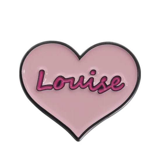 Celebrate strong women with My Cutesy Era’s pink heart-shaped enamel pin, featuring Louise in dark pink cursive—a subtle, feminist accessory.