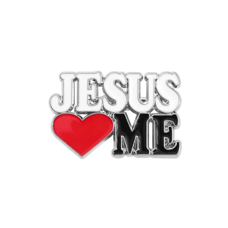 The Kiss Me Later pin is a cute pink enamel accessory with JESUS and ME in gold, separated by a red heart on a white background, creatively expressing the message “Jesus loves me.”.
