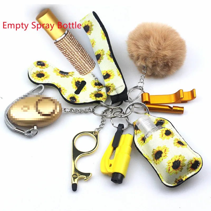 The Kiss Me Later sunflower keychain set includes a pom-pom, yellow Empty Spray Bottle, pepper spray, no-touch tool, alarm, gold cat ear keychain, and lipstick holder—all on one ring.