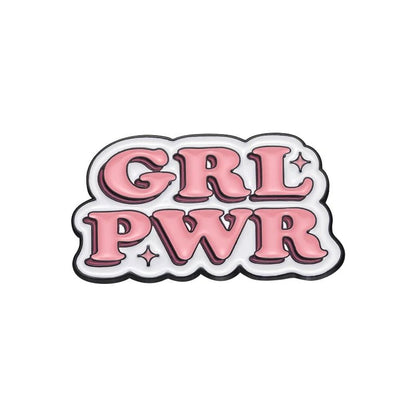 Show off your style with enamel pin featuring GRL PWR in bold pink lettering outlined in black, sparkles on a white background. A must-have accessory for fans of feminist pins!.