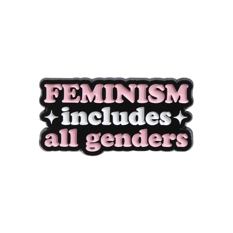 enamel pin features “FEMINISM includes all genders” in bold pink and white on black, with two white sparkle icons—an ideal accessory for self-love and allyship.