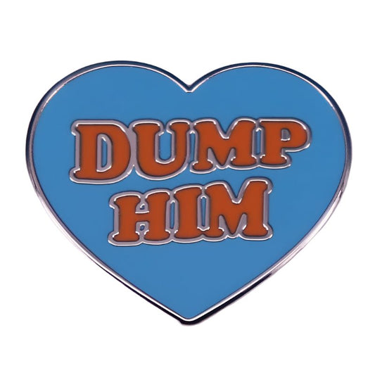 My Cutesy Era pink love heart pin features bold orange “DUMP HIM” lettering on a blue background.