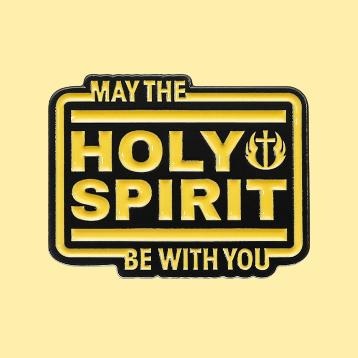 A black and yellow Holy Spirit pin featuring May the Holy Spirit be with you and a small flame and cross symbol beside the word Holy.