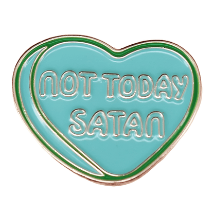 My Cutesy Era’s turquoise love heart enamel pin features NOT TODAY SATAN in bold white letters outlined in silver.