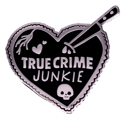 Heart-shaped enamel pin with 'True Crime Junkie' text and knife design on a white background