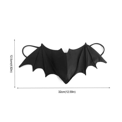 A Gay Skate black bat mask with pointed wings and ear loops, made of reusable cloth, measures about 32 cm wide by 12.5 cm tall and is shown on a white background with labeled measurements.
