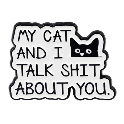 My cat and I talk shit about you enamel pin features a bold black cat face on white—perfect for pet lovers. Simple, funny, and ships worldwide!.