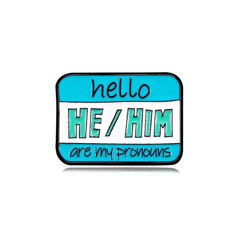 Blue and white name badge reads hello HE/HIM are my pronouns in bold and handwritten fonts. This colourful pronouns accessory is a perfect pin, with worldwide shipping available.
