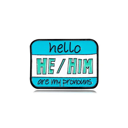 Blue and white name badge reads hello HE/HIM are my pronouns in bold and handwritten fonts. This colourful pronouns accessory is a perfect pin, with worldwide shipping available.