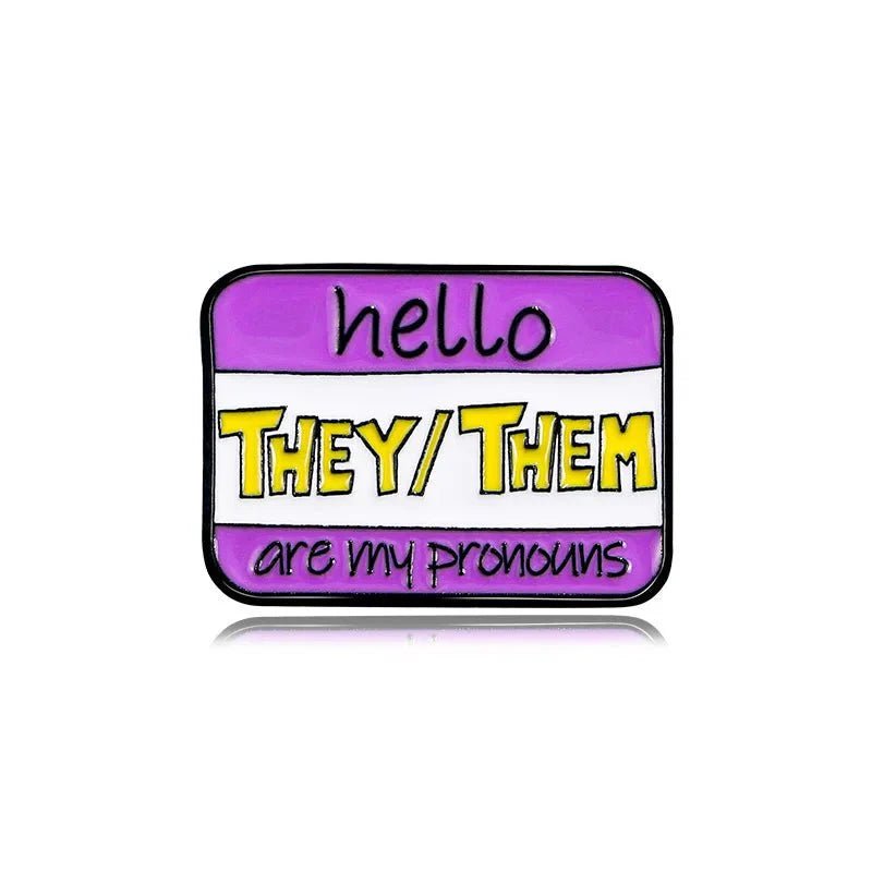 A colourful rectangular pin with a purple, white, and lavender striped background reads hello THEY/THEM are my pronouns in black and yellow text. Ships worldwide.