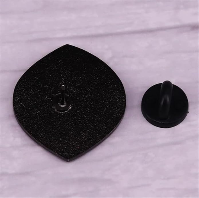 enamel pin with a metal post and black rubber backing rests on a light marbled surface. Order this unique accessory for worldwide shipping.