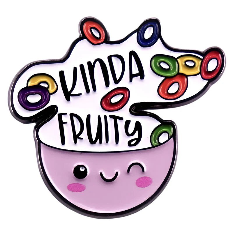 A cute, purple bowl winks under “KINDA FRUITY” with bright fruit loops spilling out—this kawaii enamel pin from Kiss Me Later is a playful celebration of queer pride.