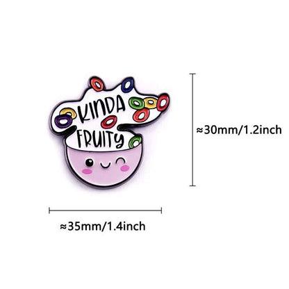 Add a touch of queer charm with this Kiss Me Later kawaii enamel pin, shaped like a smiling bowl of colorful cereal with “KINDA FRUITY” in the bowl. Measures approx. 35mm wide by 30mm tall.