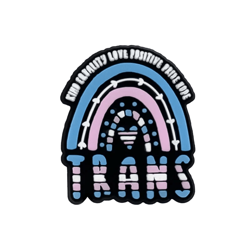 A playful, bold design by Kiss Me Later: a rainbow in blue, pink, and white Trans Flag colors with “Find beauty, love, positivity, pride” above and “TRANS” below—perfect for celebrating with pride charms.