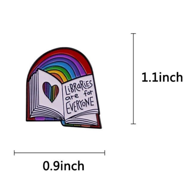 enamel badge features an open book with a rainbow and heart, reading Libraries Are For Everyone. Measuring 1.1 x 0.9, this pin ships worldwide.