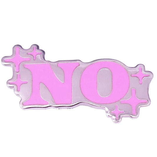 The Kiss Me Later silver heart pin features NO in bold pink letters, surrounded by small pink star-shaped sparkles on a light purple background.